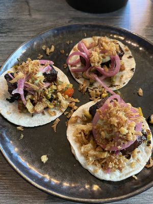 Jerk pork belly tostados  at Jam Delish in North London