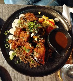 Pollo frito con boniato, lentejas y ensalada at Jam Delish in North London