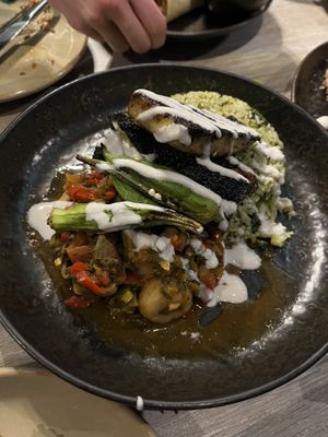 Callaloo and codfish - this was utterly delicious. The codfish was great and the spinach rice was so flavourful  at Jam Delish in North London