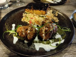 Fysh on fried rice with callaloo fritters at Jam Delish in North London