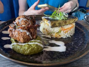 Grilled codfish and callaloo fritters  at Jam Delish in North London