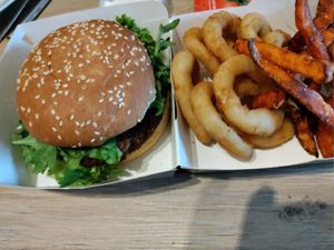Happy King Burger with sweet potato fries (and onion rings) (the sweet potato portion is way larger, just couldn't fit everything in) at Loving Hut in St Kanzian