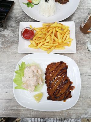 Wiener harmony with potaote salad and fries at Loving Hut in St Kanzian