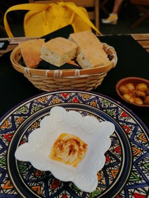 Courtesy hummus and spicy olives at Dükela in Pontevedra