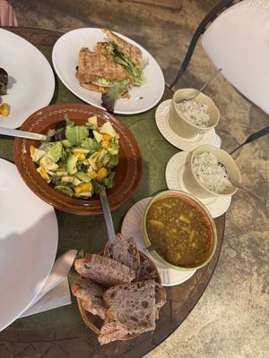The curry with extra rice, vegan burger and avocado salad with extra bread   at Natural Cafe in Mallorca