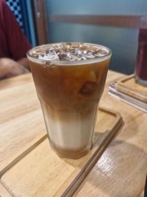 Iced oat latte with pistachio milk at Began Vegan in Bangkok