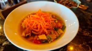 Tom Yam Tofu with shredded carrot at The Road Less Travelled in Koh Samui