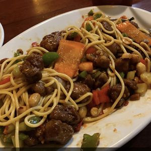 Kung Pao with side of wheat noddles    at Vegan Kitchen in Naples