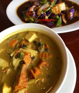 Eggplant stir fry (top) and sweet potato curry (bottom) at Vegan Kitchen in Naples