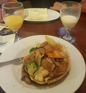 Avocado wrap and noddles at Vegan Kitchen in Naples