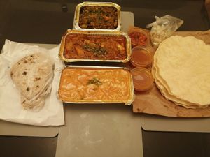 Sag aloo, veg bhuna, veg dansak, chapati and poppadoms at Lancers Restaurant in Doncaster