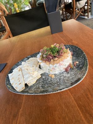 Olivier salad with vegan tuna, olives, pickles and toasted nordic bread  at Chez Kessler in Barcelona