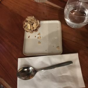 Banoffee pie (pastry case, sauce, dried banana chips). Teaspoon for size 😂  at Horticulture in Newcastle Upon Tyne