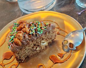 caramelized peanut cake with creamy peanut-cocoa sauce at Café Contresort in Paris