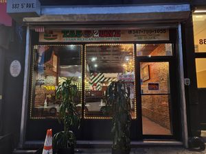 From door taco zone Tacozonebrooklyn.com at Taco Zone in Brooklyn