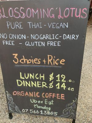 Sign on footpath  at Blossoming Lotus in Surfers Paradise