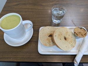 Chaga Matcha 16oz and plain bagel PB at Fueling Station Cafe in San Francisco