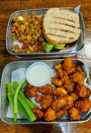 Tiger breakfast sandwich & cauli wings -- you get a TON of cauliflower, and it is very buttery tasting! at Planted Plate in Princeton