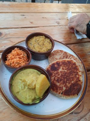 YES! Roti bread combo plate with dal, potato curry, shredded coconut/ chilies at Mirisata in Portland