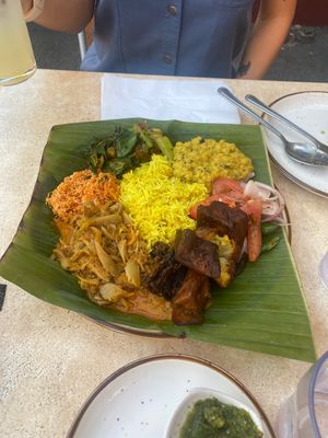 Daily Special! Oyster Mushroom curry, deviled potatoes, tempered Bok Choi, Takkali Sambol, Dahl, yellow rice, Papadam not pictured😄fucking delicious!!  at Mirisata in Portland