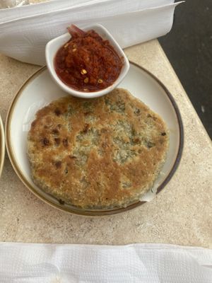 Hot chilli Pol Roti! She thicccccc and spicy just like I like it!!!  at Mirisata in Portland