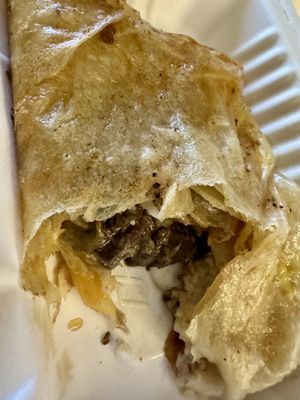 “Pork” curry in cashew cheese roti 🫓   at Mirisata in Portland