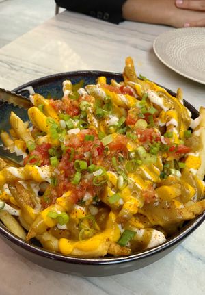 Loaded fries at PLANTA Cocina in Toronto