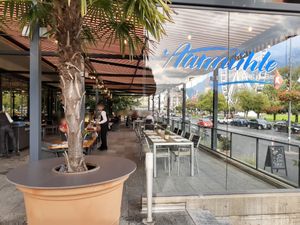 Outdoor seating and view at Aarmühle in Interlaken