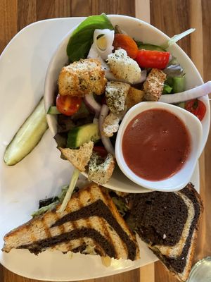 Portobello Reuben subbed vegan cheese and a side salad with raspberry vinaigrette as dressing  at Jules' Bistro in St Cloud