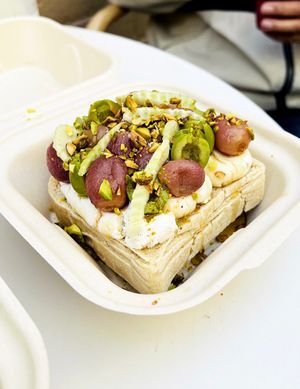 ‘Honey At the Table’ toast (minus the honey, plus agave). GF/V sourdough, almond ricotta, roasted grape, fennel, olive, pistachio, shave and lemon zest. Delish!!   at Ordinarie Fare in Dayton