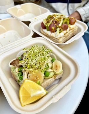 ‘Starlings in the Winter’ toast. 
GF/V Sourdough, Pesto Almond Ricotta, Wild Mushroom, Pearl Onion, Pea, Microgreens  at Ordinarie Fare in Dayton