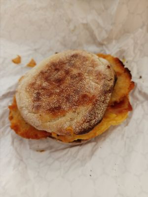 Bacon, egg, cheese, and hash brown sandwich at Sojo's Donuts in Mesa