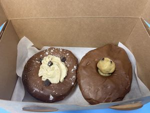 Cannoli filled donut (left) and cookie dough donut (right)  at Sojo's Donuts in Mesa