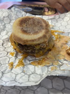 “Sausage egg” sandwich with hash brown and Mayo chipotle sauce   at Sojo's Donuts in Mesa