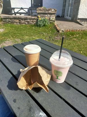 Coffee, millionaire slice and strawberry milkshake.  at Lucy's in Ardfern