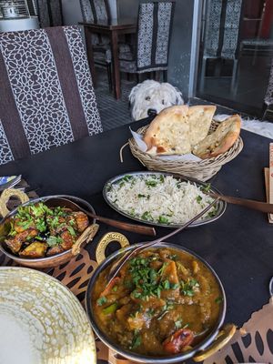 Tikka masala, eggplant dish, garlic naan and rice at Kama del Mar in Castelldefels