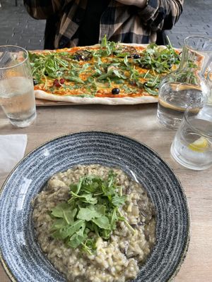 Veganised funghi risotto and primavera pizza at Wildwood in Plymouth