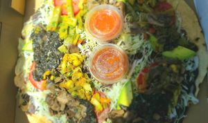 Tlayuda Vegana (bean, avocado, cabbage tostada) at Culturas Hidalgo y Oaxaca Restaurant in Salinas