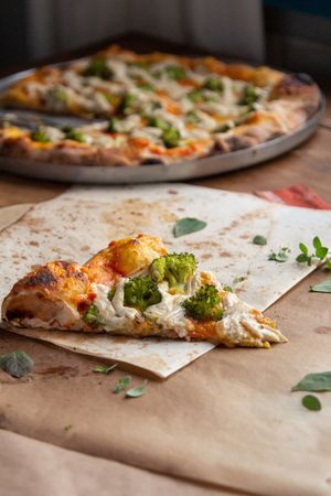 Broccoli with tofu cheese at Magia Cantina Vegana in Santa Catarina