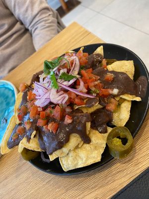 Nachos with refried beans at Sexy Tacos in 