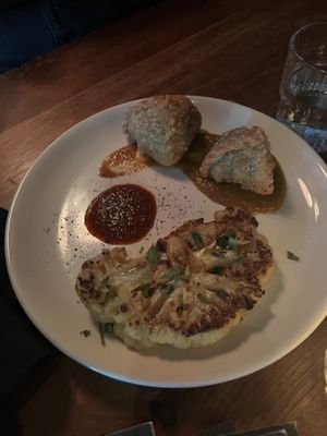 Cauliflower steak and samosas   at Cloak & Dagger in Cleveland