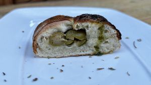 focaccia loaf with olives, complimentary taste  at La Leyenda de L'Antico Forno in Puerto Viejo De Talamanca