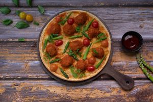 Vegan Meat Ball Pizza
Plant-Based Meat Balls by Just Vegan, Asparagus, leaves, pepper, tomato & vegan cheese
 at Just Vegan - Marina Walk Pearl in Dubai
