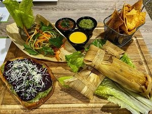 Tamale platter with avocado and beetroot toast at Just Vegan - Marina Walk Pearl in Dubai