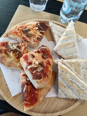 Salami pizza and mortadella toastie at efrem in Turin