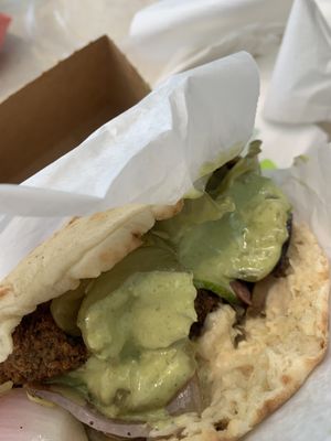 stuffed pita with a ton of toppings omnomnomnomnom   at DEN - Garbanzo Mediterranean Fresh - TB in Denver