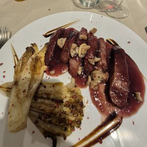Seitan con castagne e salsa al vin cotto, con contorno di indivia belga at MiBiò bistrot in Milan