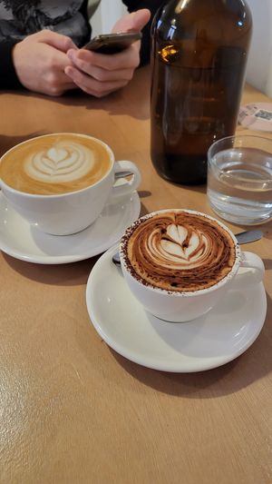 Flat white and cappuccino  at Plant Vibes Cafe in Bowen Hills