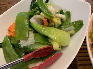 Snow pea with broccoli in homemade mushroom sauce. at Green Sprouts Vegetarian in Neutral Bay