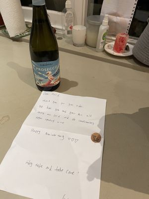 Personal note and complimentary bottle of Prosecco for anniversary ;) at Green Sprouts Vegetarian in Neutral Bay